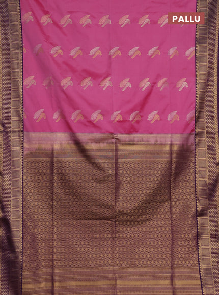 Semi soft silk saree pink and purple with allover zari woven buttas and zari woven border