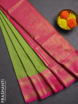 Semi soft silk saree light green and pink with allover zari weaves & paisley buttas and zari woven border