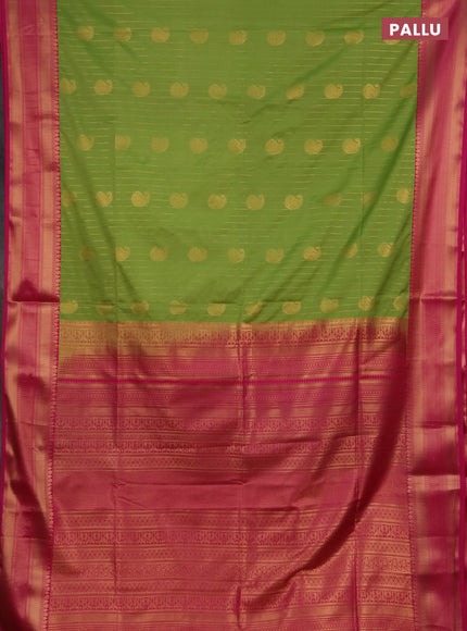Semi soft silk saree light green and pink with allover zari weaves & paisley buttas and zari woven border