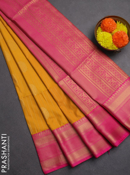 Semi soft silk saree mustard yellow and pink with allover zari weaves & paisley buttas and zari woven border