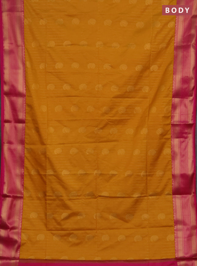 Semi soft silk saree mustard yellow and pink with allover zari weaves & paisley buttas and zari woven border