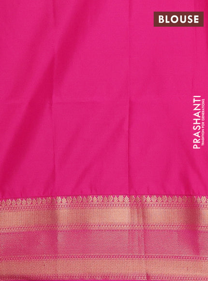Semi soft silk saree green and pink with allover zari weaves & paisley buttas and zari woven border
