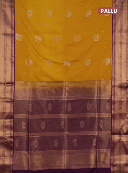 Semi soft silk saree mustard yellow and purple with allover silver & gold zari woven buttas and zari woven border