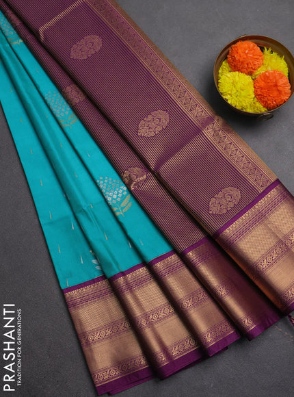 Semi soft silk saree teal green and purple with allover silver & gold zari woven buttas and zari woven border