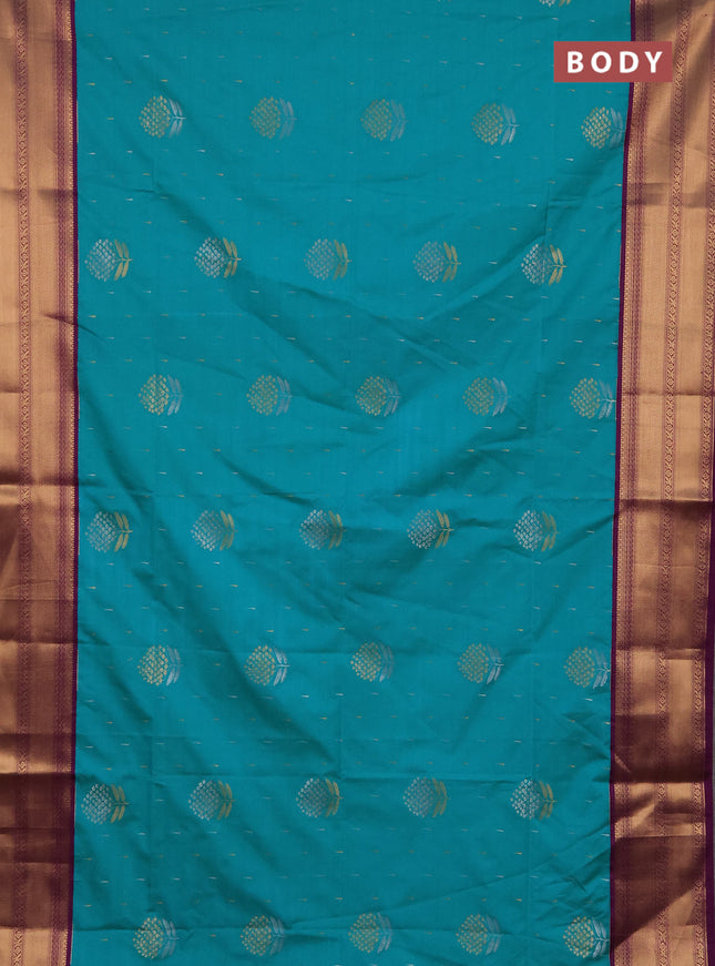 Semi soft silk saree teal green and purple with allover silver & gold zari woven buttas and zari woven border