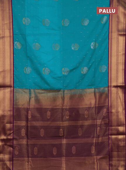 Semi soft silk saree teal green and purple with allover silver & gold zari woven buttas and zari woven border