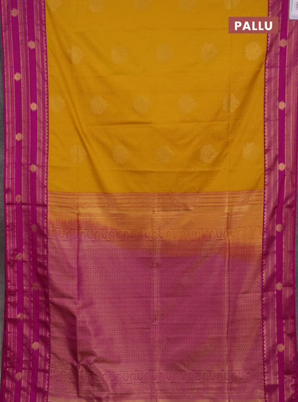 Semi soft silk saree mustard yellow and magenta pink with allover zari woven buttas and rettapet zai woven butta border