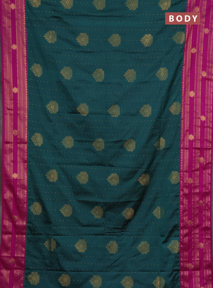 Semi soft silk saree peacock green and magenta pink with allover zari woven buttas and rettapet zai woven butta border
