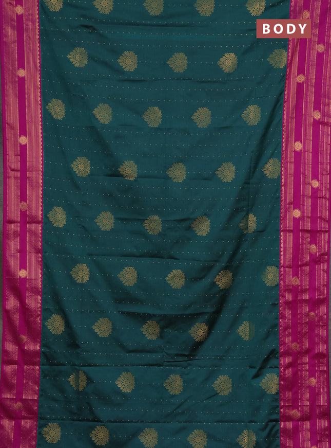 Semi soft silk saree peacock green and magenta pink with allover zari woven buttas and rettapet zai woven butta border