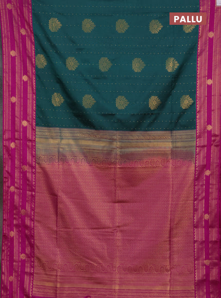 Semi soft silk saree peacock green and magenta pink with allover zari woven buttas and rettapet zai woven butta border