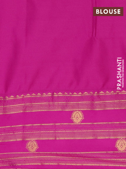 Semi soft silk saree peacock green and magenta pink with allover zari woven buttas and rettapet zai woven butta border