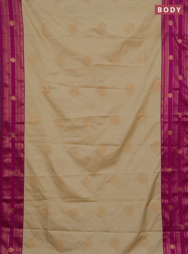 Semi soft silk saree beige and magenta pink with allover zari woven buttas and rettapet zai woven butta border