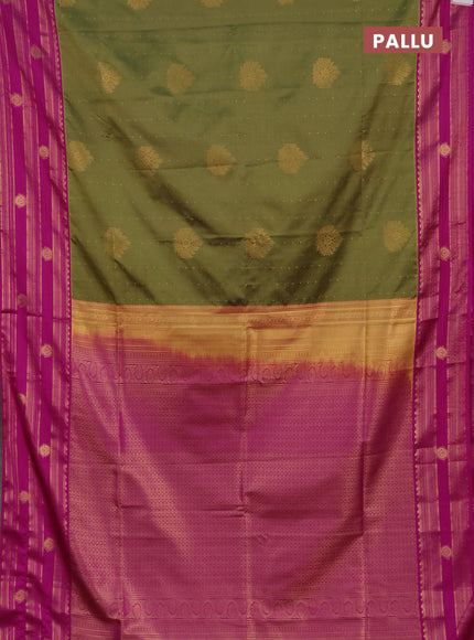 Semi soft silk saree mehendi green and magenta pink with allover zari woven buttas and rettapet zai woven butta border