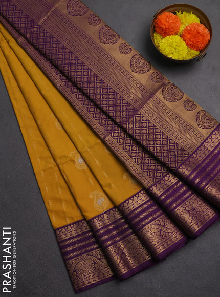 Semi soft silk saree mustard yellow and purple with allover silver & gold zari woven buttas and zari woven border