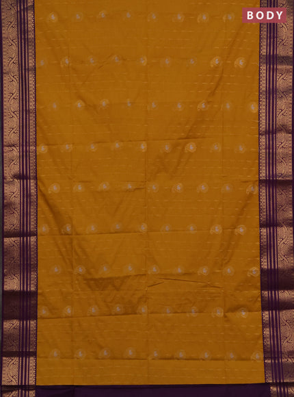 Semi soft silk saree mustard yellow and purple with allover silver & gold zari woven buttas and zari woven border