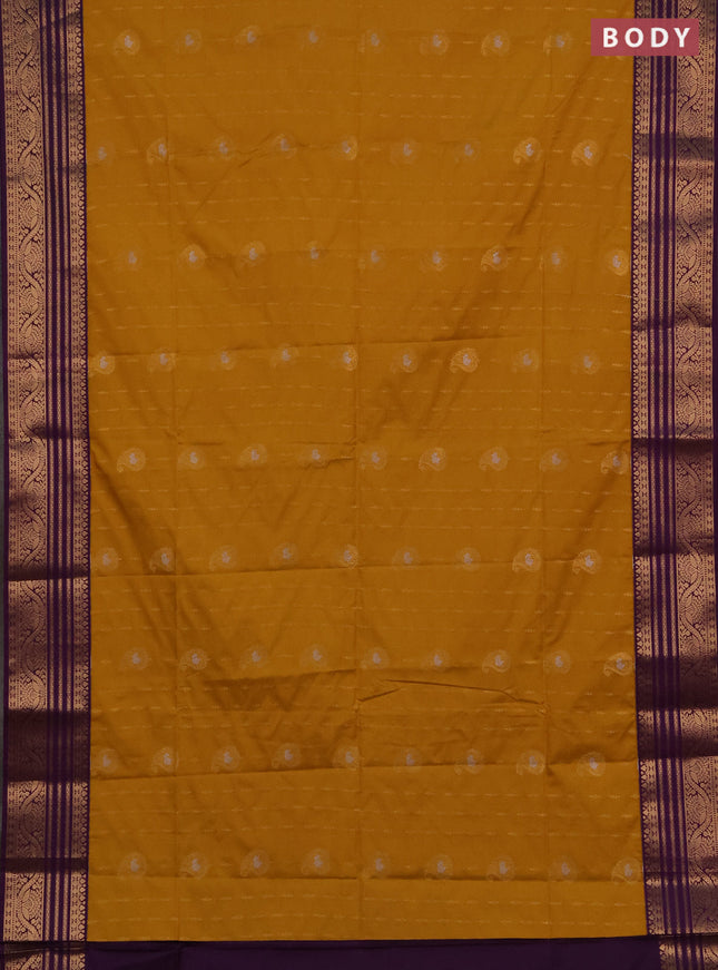 Semi soft silk saree mustard yellow and purple with allover silver & gold zari woven buttas and zari woven border