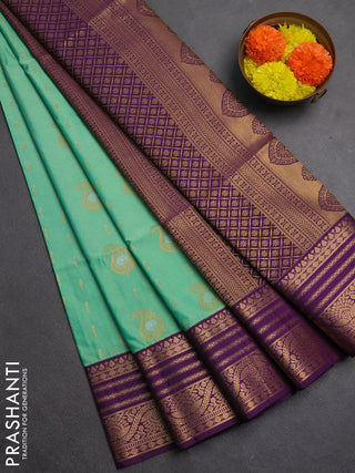Semi soft silk saree light green and purple with allover silver & gold zari woven buttas and zari woven border