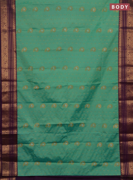 Semi soft silk saree light green and purple with allover silver & gold zari woven buttas and zari woven border