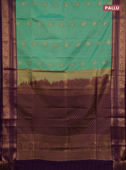 Semi soft silk saree light green and purple with allover silver & gold zari woven buttas and zari woven border
