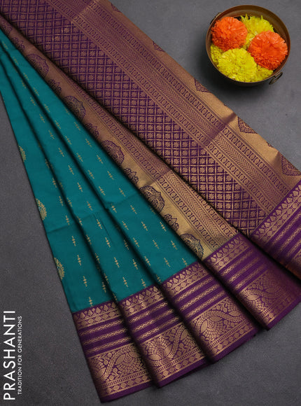 Semi soft silk saree teal green and purple with allover silver & gold zari woven buttas and zari woven border