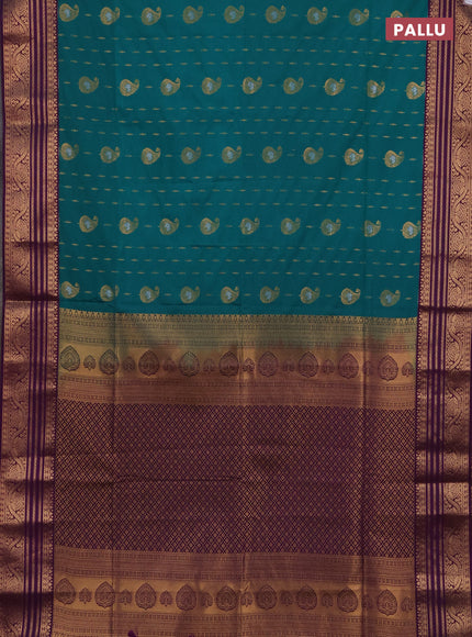 Semi soft silk saree teal green and purple with allover silver & gold zari woven buttas and zari woven border