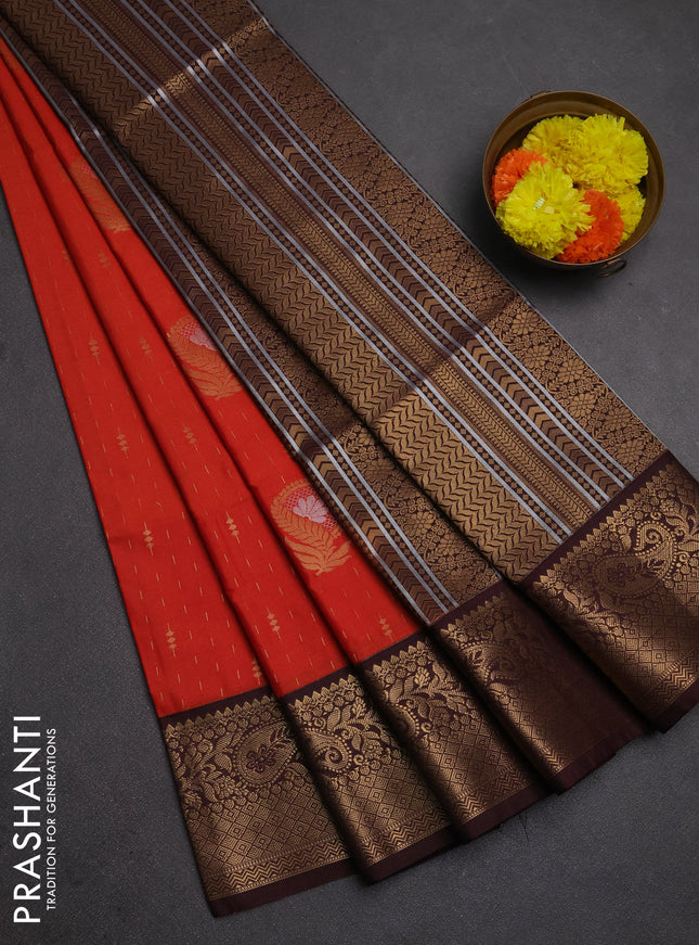 Semi soft silk saree rustic orange and deep maroon with allover zari weaves & buttas and zari woven border