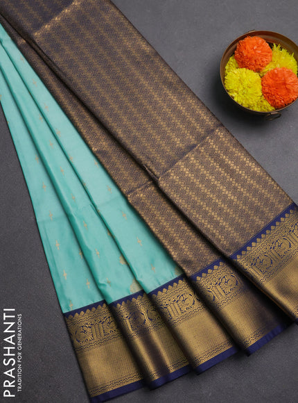 Semi soft silk saree teal shade and navy blue with allover zari woven buttas and rettapet zari woven border