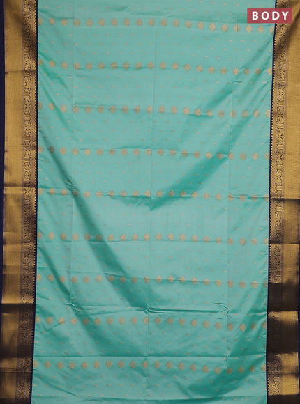 Semi soft silk saree teal shade and navy blue with allover zari woven buttas and rettapet zari woven border