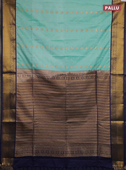 Semi soft silk saree teal shade and navy blue with allover zari woven buttas and rettapet zari woven border