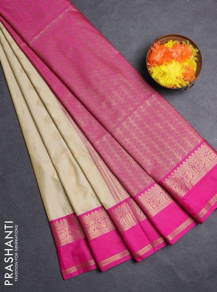 Semi soft silk saree beige and pink with allover zari woven buttas and rettapet zari woven border