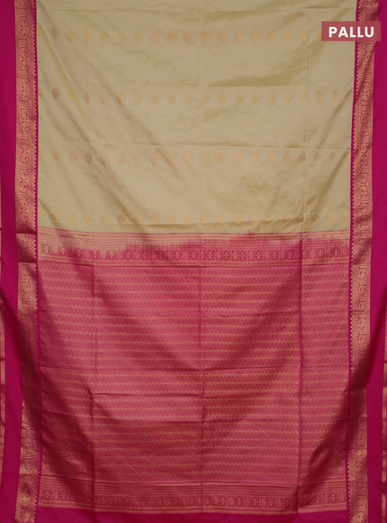 Semi soft silk saree beige and pink with allover zari woven buttas and rettapet zari woven border