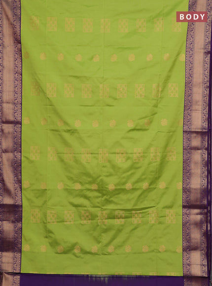 Semi soft silk saree green and purple with allover zari woven buttas and zari woven border