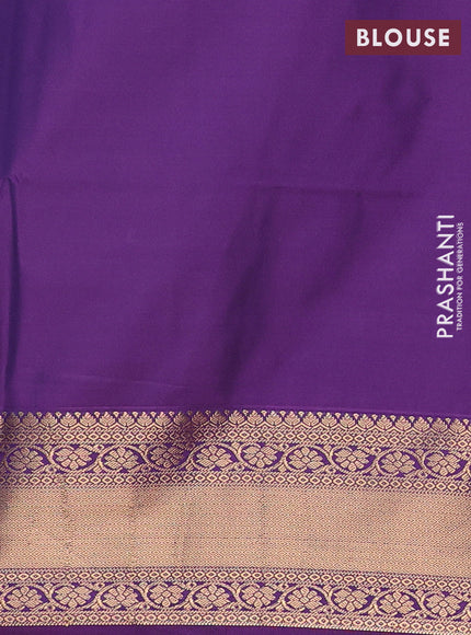 Semi soft silk saree green and purple with allover zari woven buttas and zari woven border