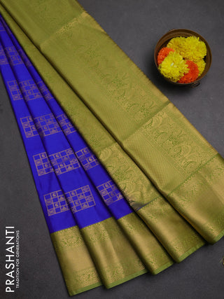 Semi soft silk saree royal blue and green with allover zari woven buttas and zari woven border