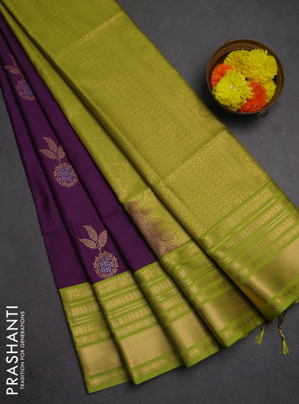 Semi soft silk saree purple and green with allover zari woven buttas and zari woven border
