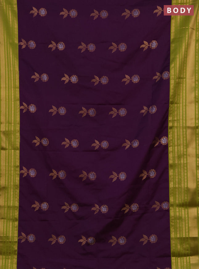 Semi soft silk saree purple and green with allover zari woven buttas and zari woven border