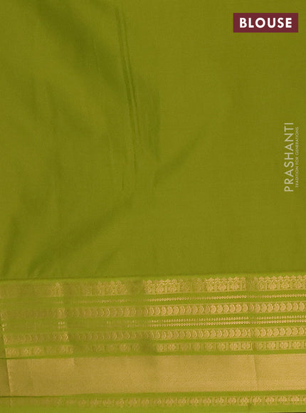 Semi soft silk saree purple and green with allover zari woven buttas and zari woven border