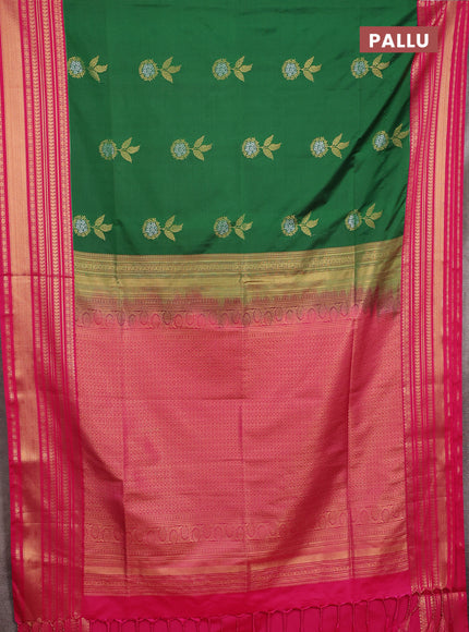Semi soft silk saree green and pink with allover zari woven buttas and zari woven border