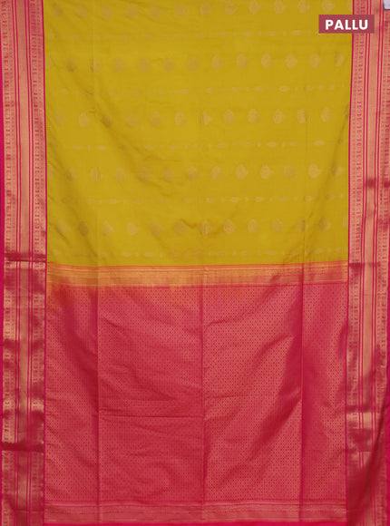 Semi soft silk saree yellow and pink with allover zari woven buttas and zari woven border