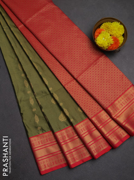 Semi soft silk saree mehendi green and dual shade of pinkish orange with allover zari woven buttas and zari woven border