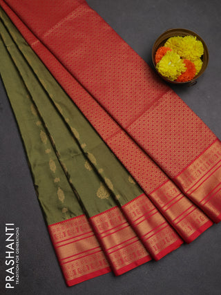Semi soft silk saree mehendi green and dual shade of pinkish orange with allover zari woven buttas and zari woven border