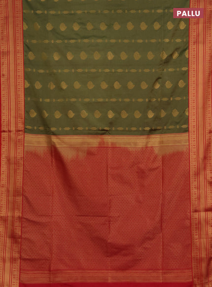Semi soft silk saree mehendi green and dual shade of pinkish orange with allover zari woven buttas and zari woven border