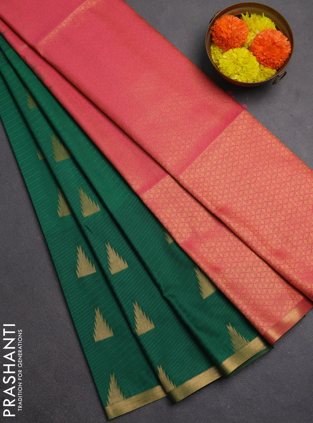 Semi soft silk saree green and candy pink with allover temple design zari woven buttas and zari woven piping border