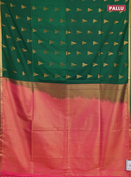 Semi soft silk saree green and candy pink with allover temple design zari woven buttas and zari woven piping border
