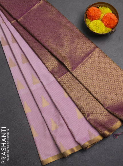 Semi soft silk saree pastel pink and purple with allover temple design zari woven buttas and zari woven piping border