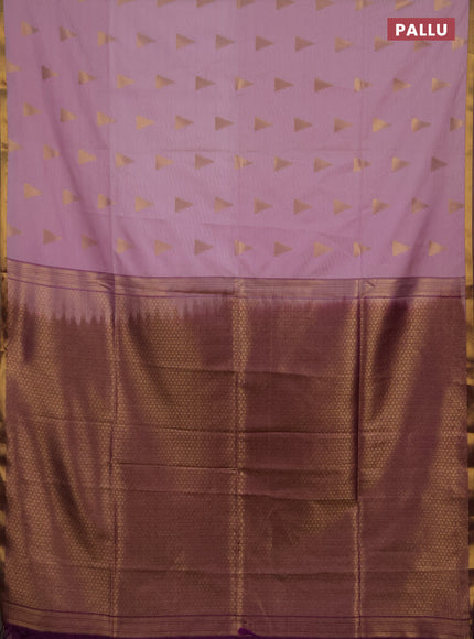 Semi soft silk saree pastel pink and purple with allover temple design zari woven buttas and zari woven piping border