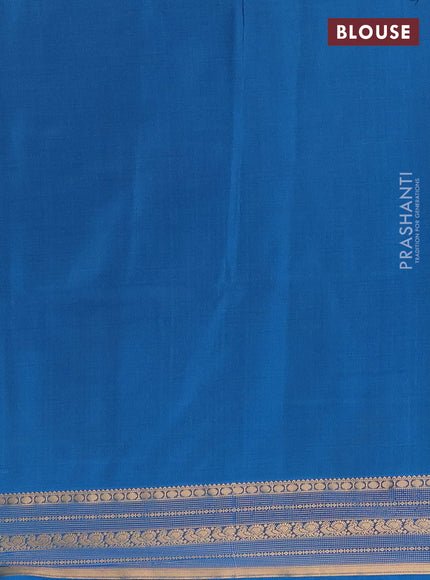 Semi soft silk saree purple and cs blue with allover zari checks & buttas and zari woven border