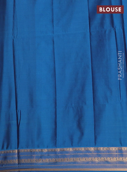 Semi soft silk saree jamun and cs blue with allover zari checks & buttas and zari woven border