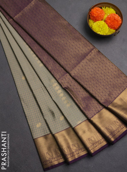 Semi soft silk saree grey shade and purple with allover zari checks & buttas and rich zari woven border