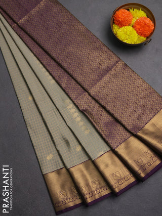 Semi soft silk saree grey shade and purple with allover zari checks & buttas and rich zari woven border